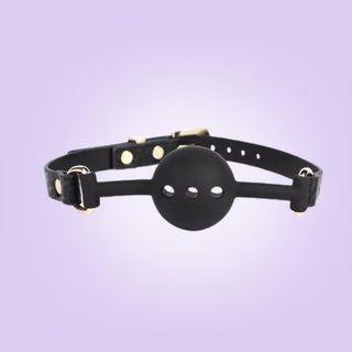 The ball gag strap has the matching ingrained pattern, an adjustable strap and a silicone ball gag. The ball has air holes to make the wearer more comfortable.