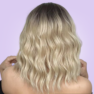 A rear view of the blonde wig, you can see the soft waves.