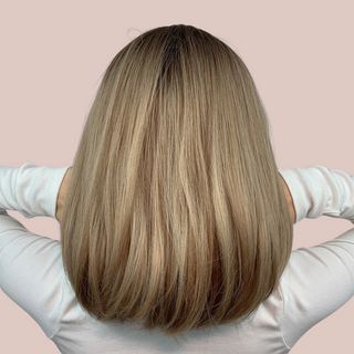 the rear view of the dark blonde long bob wig from House Of Chastity, you can see the gorgeous colour tones.