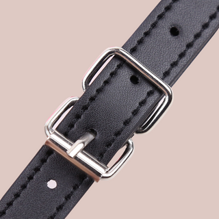 A close up of the strap and buckle to the Luscious Lips Open Mouth Gag