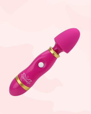 Rose Pink Mini Cordless wand, you can see the easy to press button on the front.