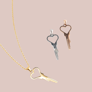 An alternate view of the three colours of necklace available, the gold is shown on its chain and the silver and rose gold are shown are shown without a chain.
