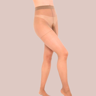 Beige men's tights being modelled and showing the closed end penis sheath.