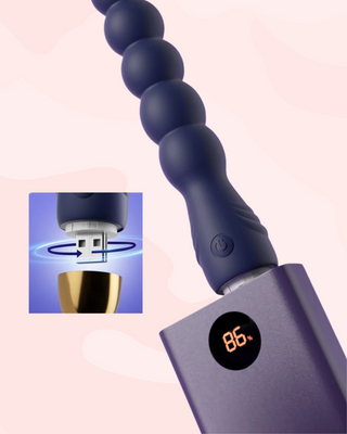 Blue vibrator  with USB charging, the product is shown being charged.