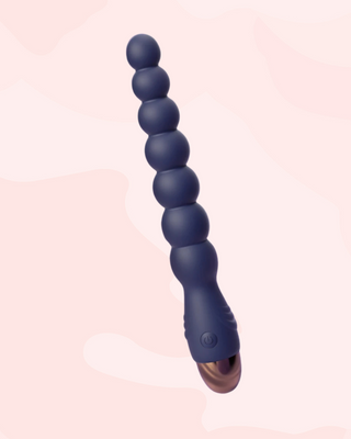 The 10 Speed Vibrator shown in full, the beaded design is clear and the easy press button control.