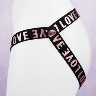 A side view of the 3 Way Restraining, you can see the popper fixing and LOVE lettering.
