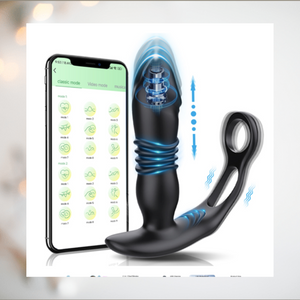 The cock ring and app controlled dildo shown along side a mobile phone  to showcase how the toy can be controlled.