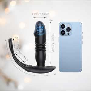 Showing all of the dimensions of the app controlled cock ring and vibrator, the mobile phone in the image helps to give an idea of size.