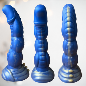 The Azazel  Dragon Spine Dildo from House Of Chastity shown from three different angles.