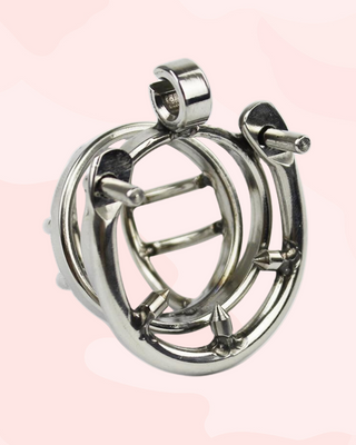 A small sized chastity cage made from stainless steel. It has a side bar design with open centre and comes with a stainless steel barbed ring. It comes in various ring sizes.