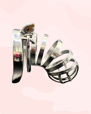Showing the length of the standard size chastity cage, you can see how the barbed ring sits just in front of the base ring and is fixed in place by the integral lock.