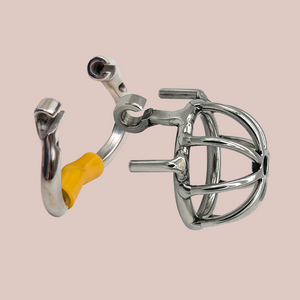 Showing the chastity cage and base ring of The Bird Cage Hinged Urethra , you can see how the hinged base ring opens and how the cage is hooked into the base ring.