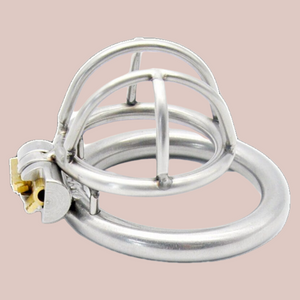 small sized chastity cage, the fretwork head of the cage fits securely into the base ring, this then allows the integral lock to be fixed into place.