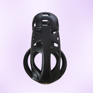 A view from above of the Cobra Naja Maxi chastity cage, the black cage is shown on a purple background
