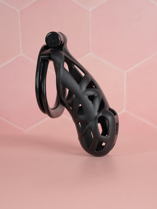 The Cobra Double Cuff chastity cage in black, this is the maxi length cage.