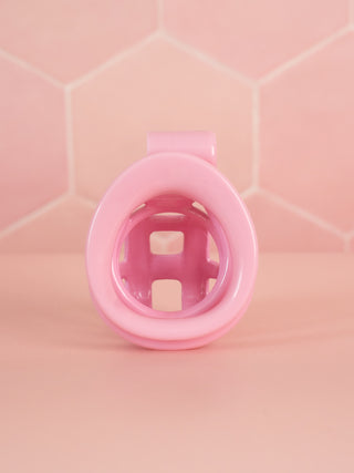 A rear view of The Cobra Double Cuff chastity cage, you can see through the base ring and into the chastity cage.