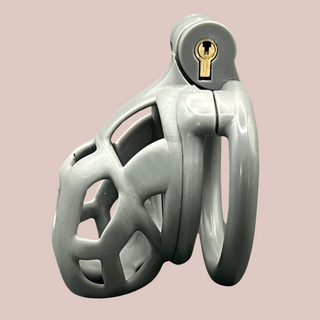 A side view of the fully assembled Cobra Flat Cuff Nano chastity cage in Grey
