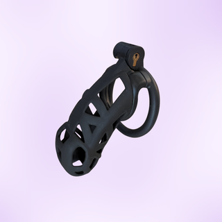 The maxi sized chastity cage on a purple background