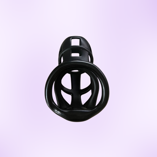 An internal view of the chastity cage, the black cage is shown on a purple background