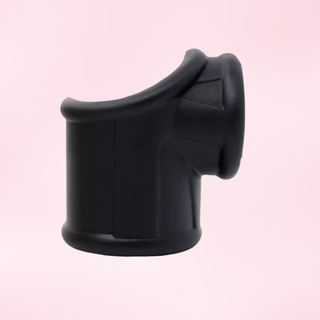 A view of the black cock ring on a pink background