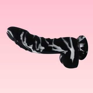 The Emberkiss dildo shown in black and white, the mottled white pattern does vary one each dildo.