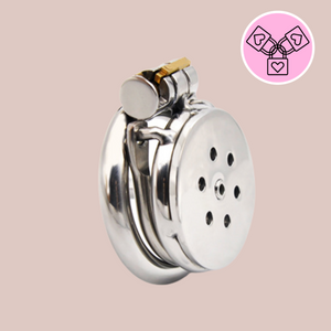 The Flat Gatling Chastity Cage shown from a front view fully assembled with the barbed anti-off ring and urethral tube fitted, you can see the flat front to the cage, how it fits into the base ring and is locked in place with the integral lock.