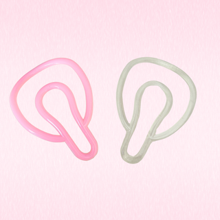 Showing the pink and transparent clips on a pink background