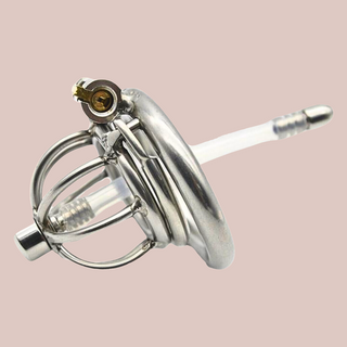 A male stainless steel nub sized chastity cage with umbrella head design with integral lock that fixes the cage and base ring together. This product also comes with a removable urethral insert.