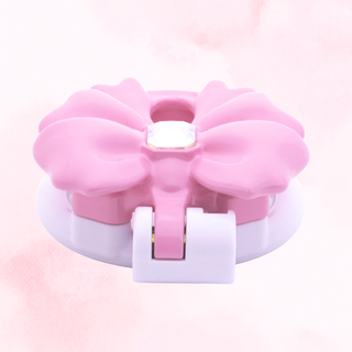 A flat view of the pink and white cage from the top of the cage