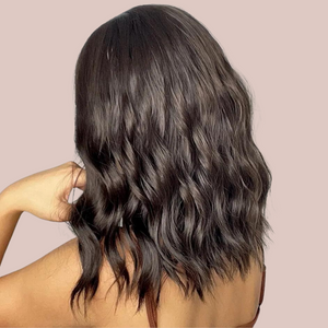 The dark brown wave shoulder length wig from House of Chastity. It has a cute wave and you can see that it is carried around through the back too..