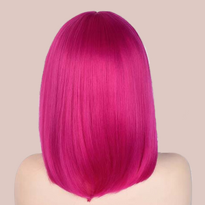 The hot pink wig shown from the back it has a flowing straight shape that sits beautifully at the back.