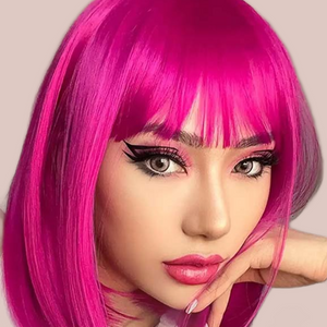 The Hot Pink shoulder length wig from House Of Chastity is shown here being modelled by a woman.