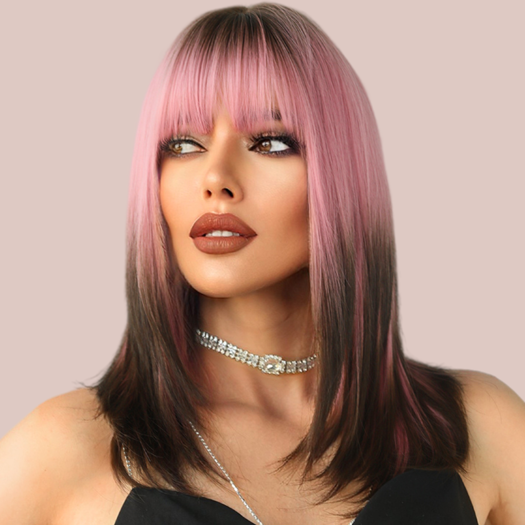 HOC9050-1 Pink/Black Ombre Shoulder Length Wig modelled for House of Chastity. Soft pink to black shoulder-length straight hair with a blunt fringe choppy ends.