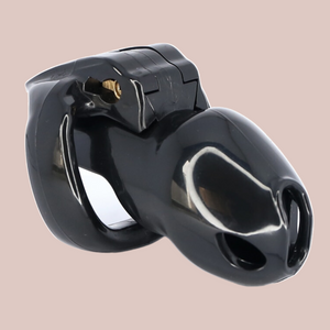 Shown is the black small cock cage that we offer in our version of the Holy Trainer range. It is shown from the side angle so that you have a full view of the assembled chastity cage, the cock cage is shown attached to a base ring and the integral lock is in place, showing how it fits to the body. This product is the black version, these cages also come in pink and clear.