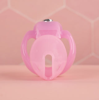  A front facing view of the HT V5 Nano chastity cage, it is shown here in pink.