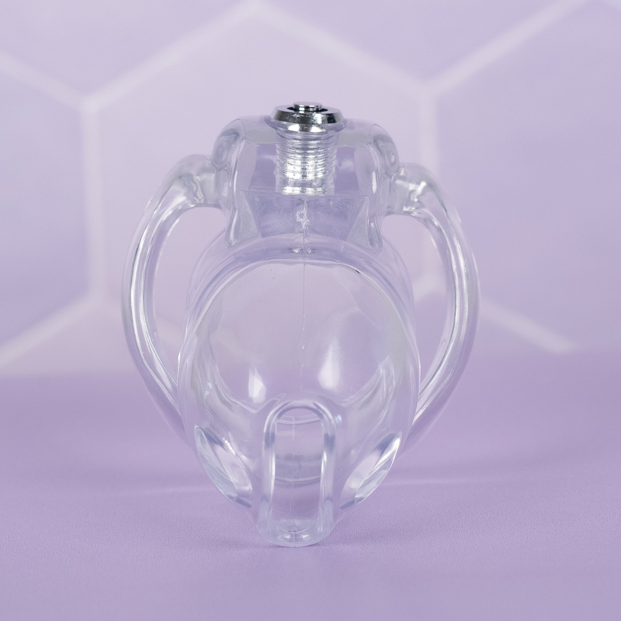  A front facing view of the HT V5 Nano chastity cage, it is shown here in transparent.