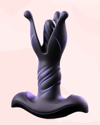 An upright view of the Bloom Burst Dilator, the toy is shown with a purple highlight to show the ergonomic design of the toy. The toy is shown with the petals open.