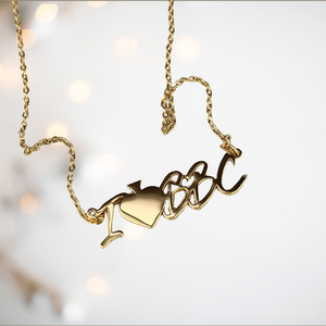 The I Heart BBC necklace from House Of Chastity shown with its long chain.