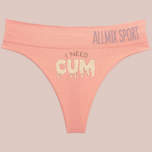 The Sissy Cum Slut sports style panties, you can see the soft pink colour of the panties, the soft grey  and white drip affect motif saying I Need Cum.