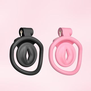 the black and pink versions of the chastity cage are shown side by side.