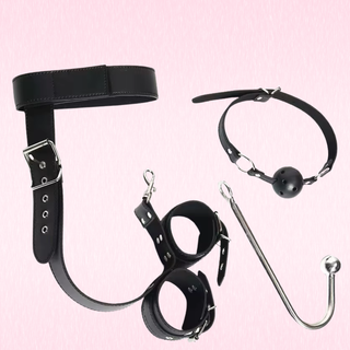 An alternate view of the complete set gag, collar wrist restraints and anal hook.