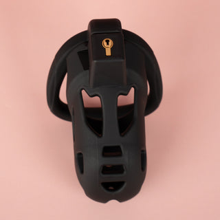 A view from above of The Jeusn in black on a pink background.