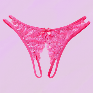 the cerise crotchless panties lying on a soft purple background