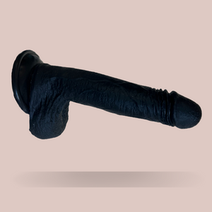 The Moonu dildo, you can see the veining to the shaft, shaped head and realistic looking glans. The sucker base is also shown..
