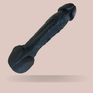 A close up of the underside of the Moonu dildo , this close up image shows the realistic looking make up of this dildo.