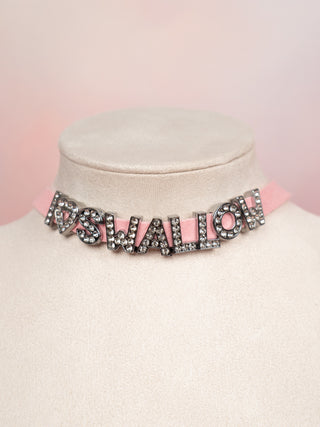 Pink suede necklace with I ♥ Swallow in diamante lettering shown on a mannequin 