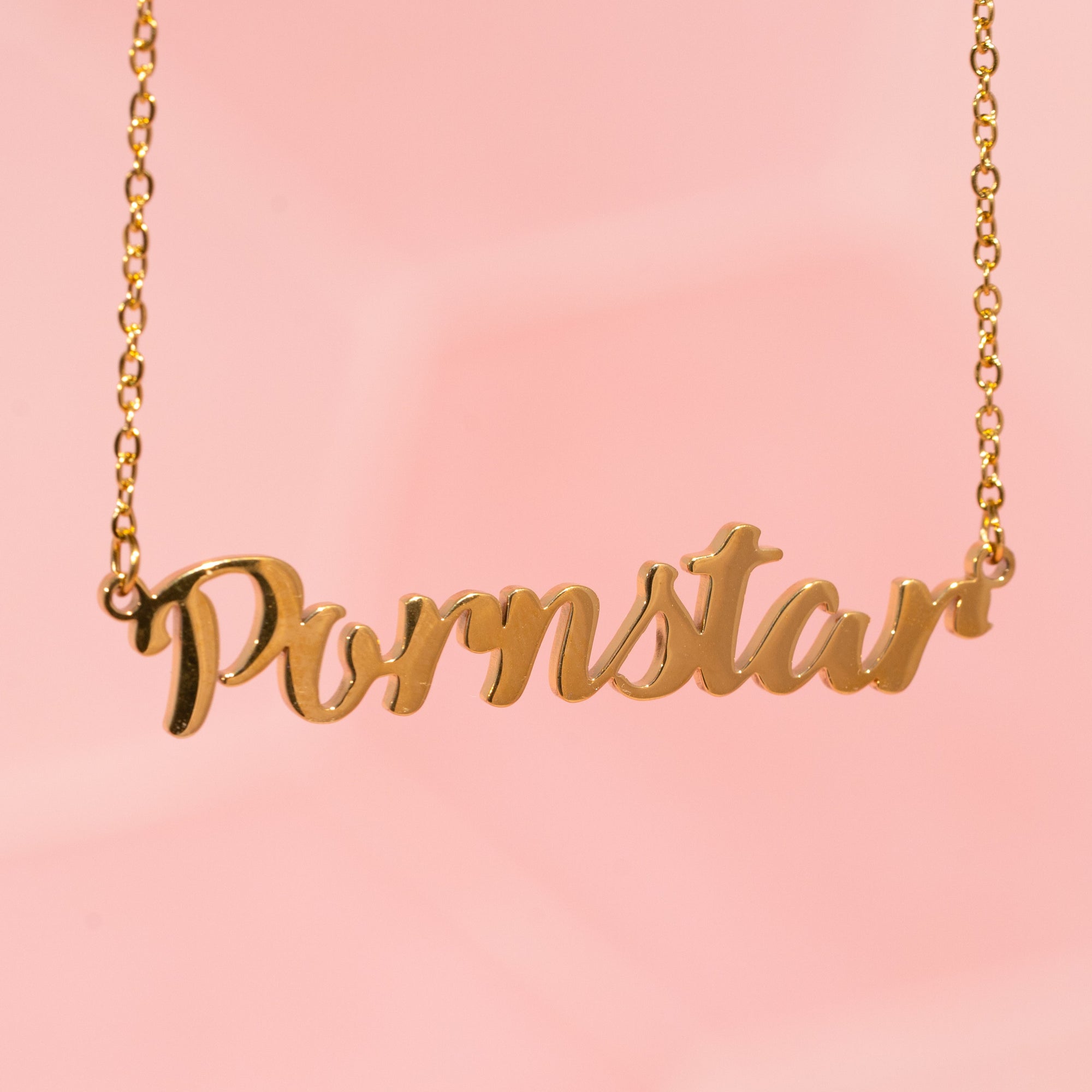 The Pornstar necklace shown hanging, you can see just how simple the necklace is but what an impact it will make.