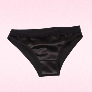 Black satin briefs with a lace waistband, displayed flat against a light pink background.