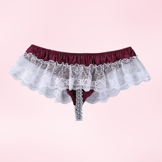 Maroon lace underwear on a pink background