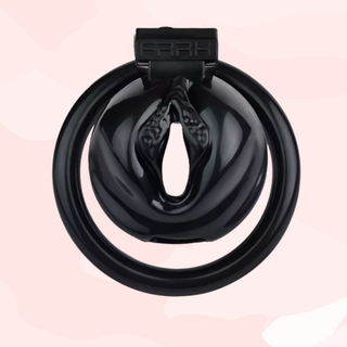 The black Sissy Pussy II chastity cage, the labia style front and FRRK engraving can be clearly seen.